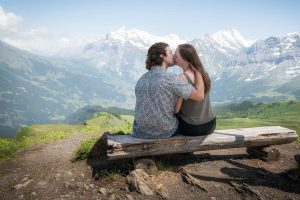 Couple photo shoot on Männlichen mountain above Wengen in the Jungfrau Region Couple photo shoot on Männlichen mountain above Wengen in the Jungfrau Region