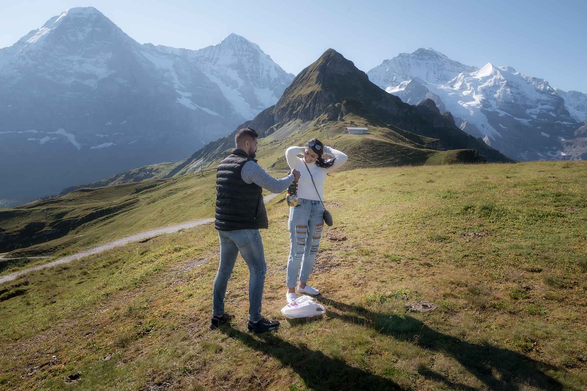 Surprise engagement in mountains above Lauterbrunnen