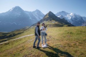 Surprise engagement in mountains above Lauterbrunnen