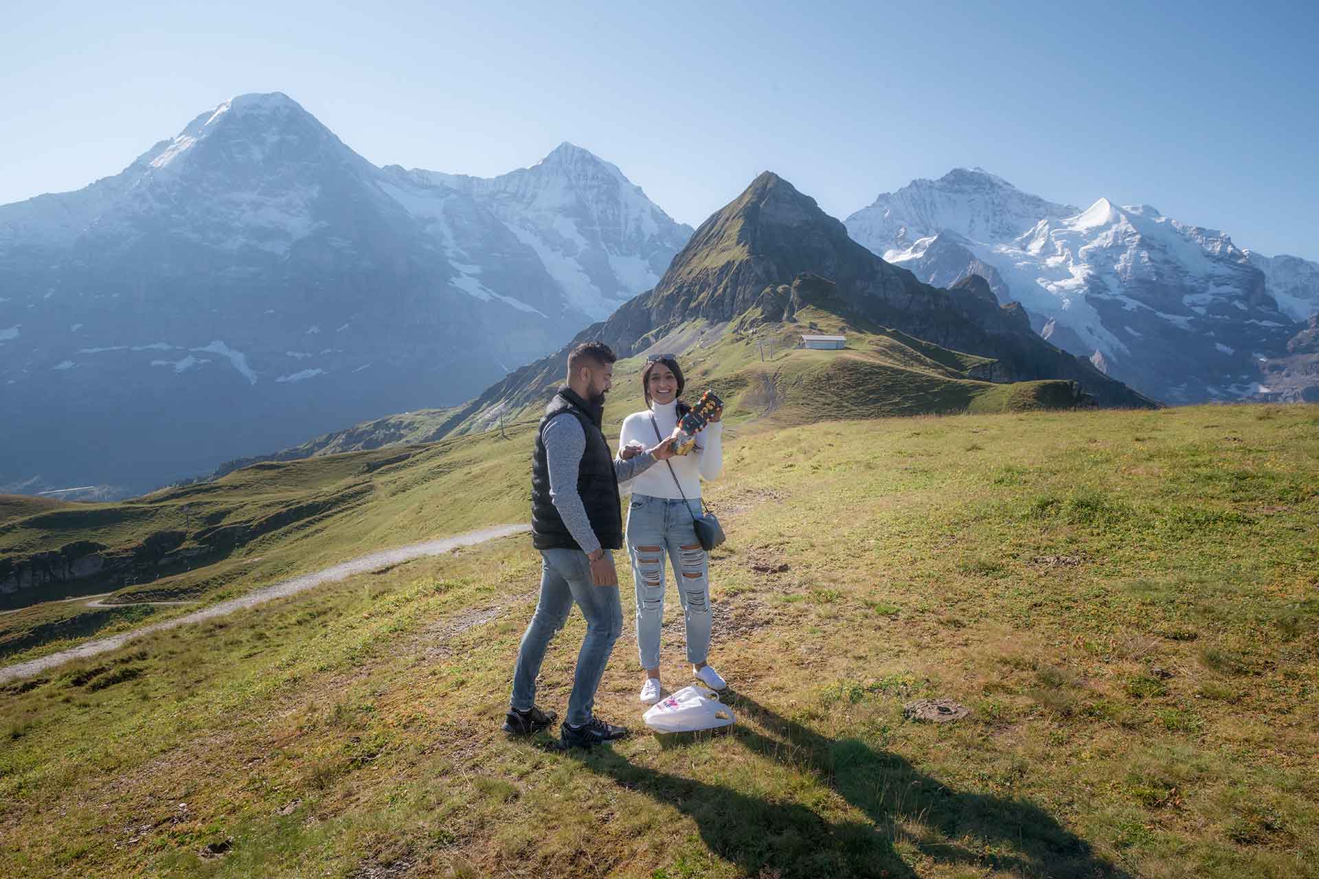 Surprise engagement in mountains above Lauterbrunnen