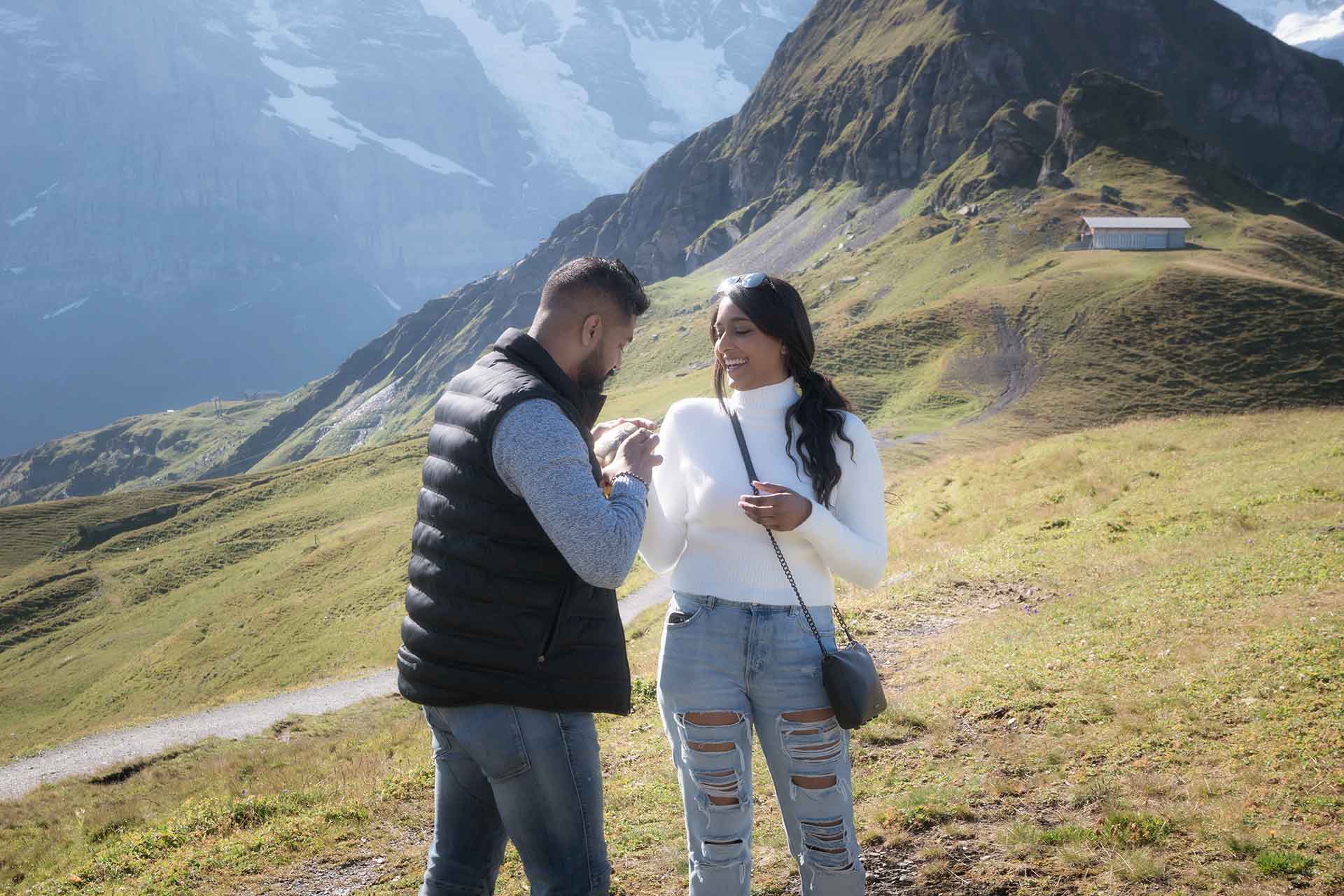 Surprise engagement in mountains above Lauterbrunnen