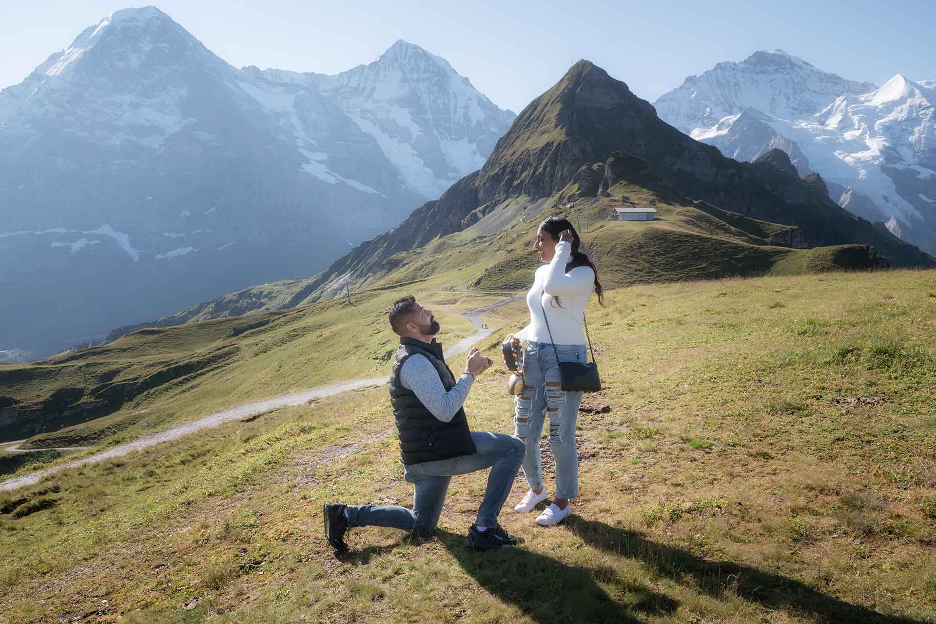 Surprise engagement in mountains above Lauterbrunnen
