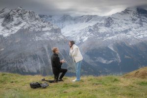 Surprise engagement on Grindelwald First. Photographer John Wisdom. Surprise Engagement Grindelwald First