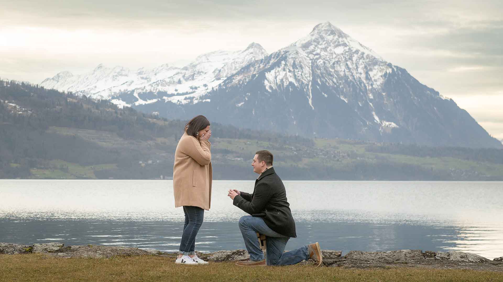 Surprise engagement by Lake Thun near Interlaken