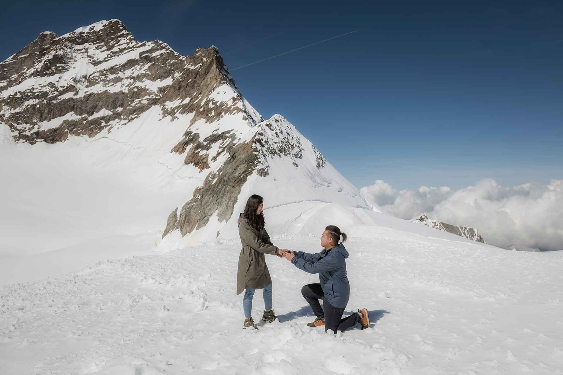 Surprise engagement on the Jungfraujoch in Switzerland