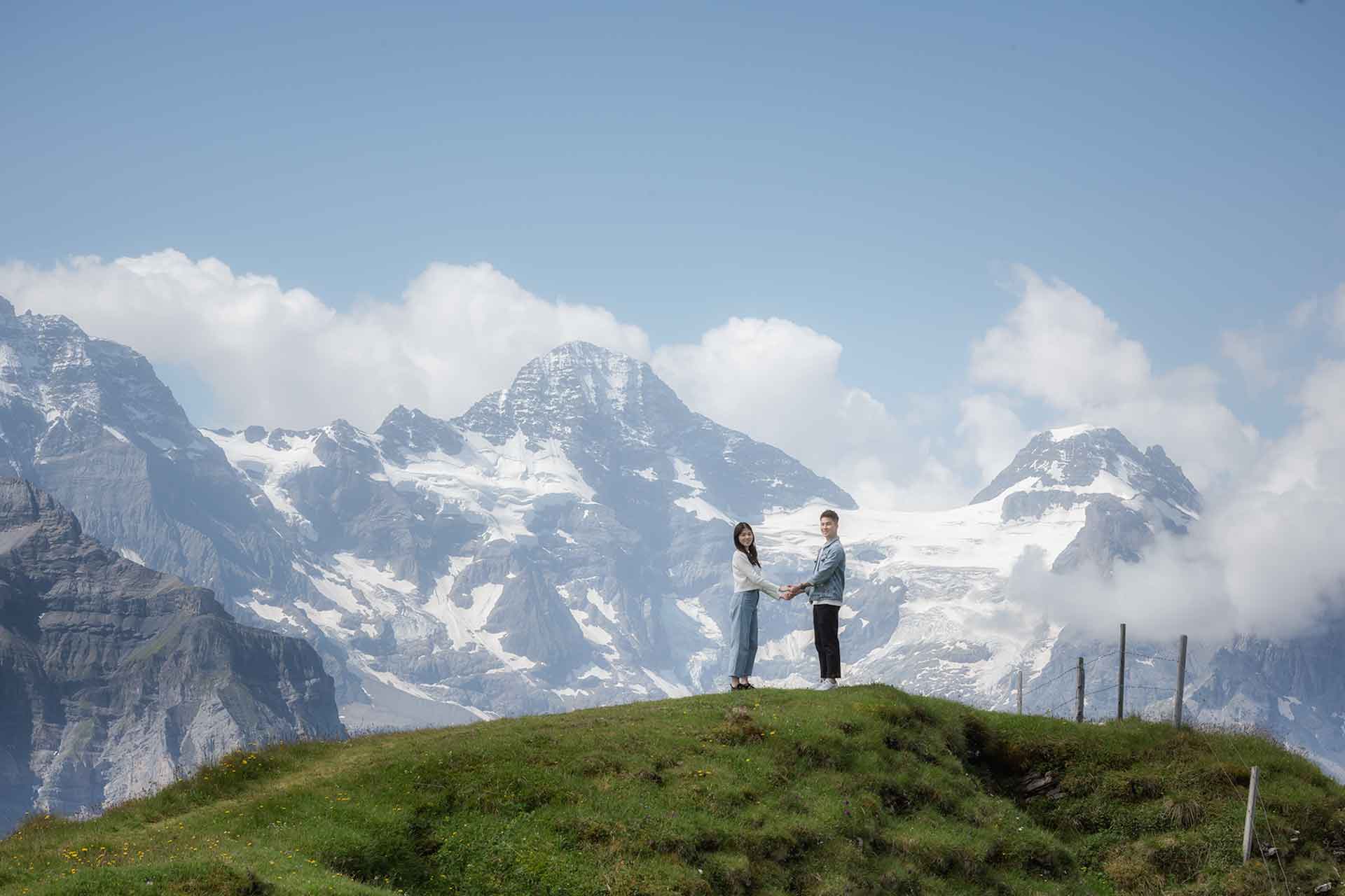 Surprise Engagement above Wengen Photographer for a surprise wedding proposal on Männlichen mountain.