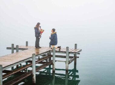 Surprise engagement on the pier in Iseltwald, Switzerland