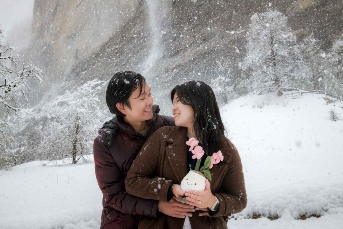 Engagement after a snow storm which  brought early morning chaos to the area. An unexpected change of the weather brought the snow back to Lauterbrunnen before Easter. A last minute change in the plans. Joel proposed to Amanda in front of the Staubbach waterfall.