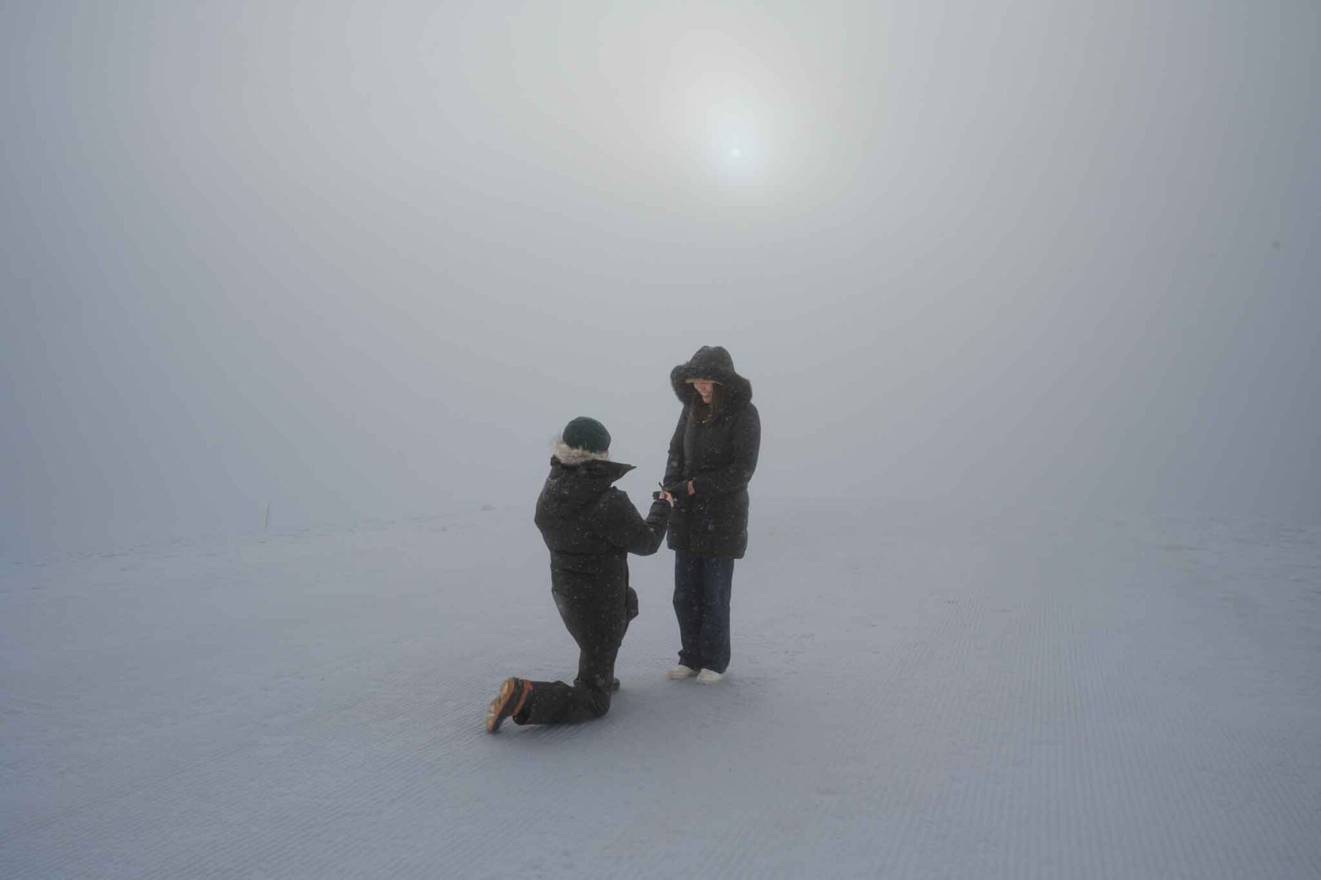 An enagegement in the clouds on Grindelwald First summit